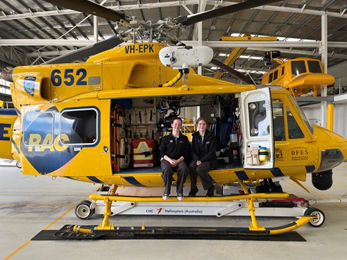 Program participants April Schroder and Vanessa Vincent sitting in the RAC Rescue helicopter