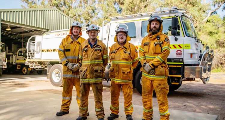 Volunteers from the Pink Lake Fire Brigade with the crew's new purpose-built Broadacre Tanker. 